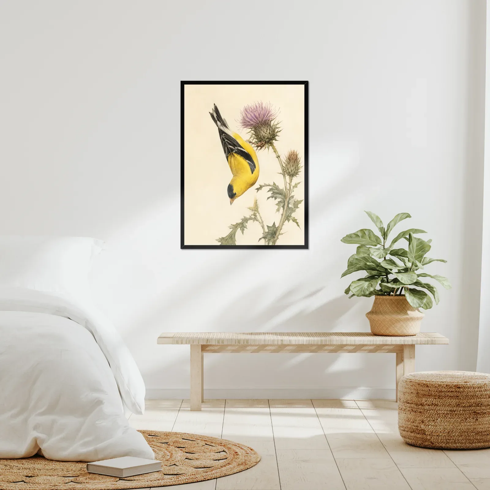 An Audubon-style bird print hung in a room, in a plain moulding