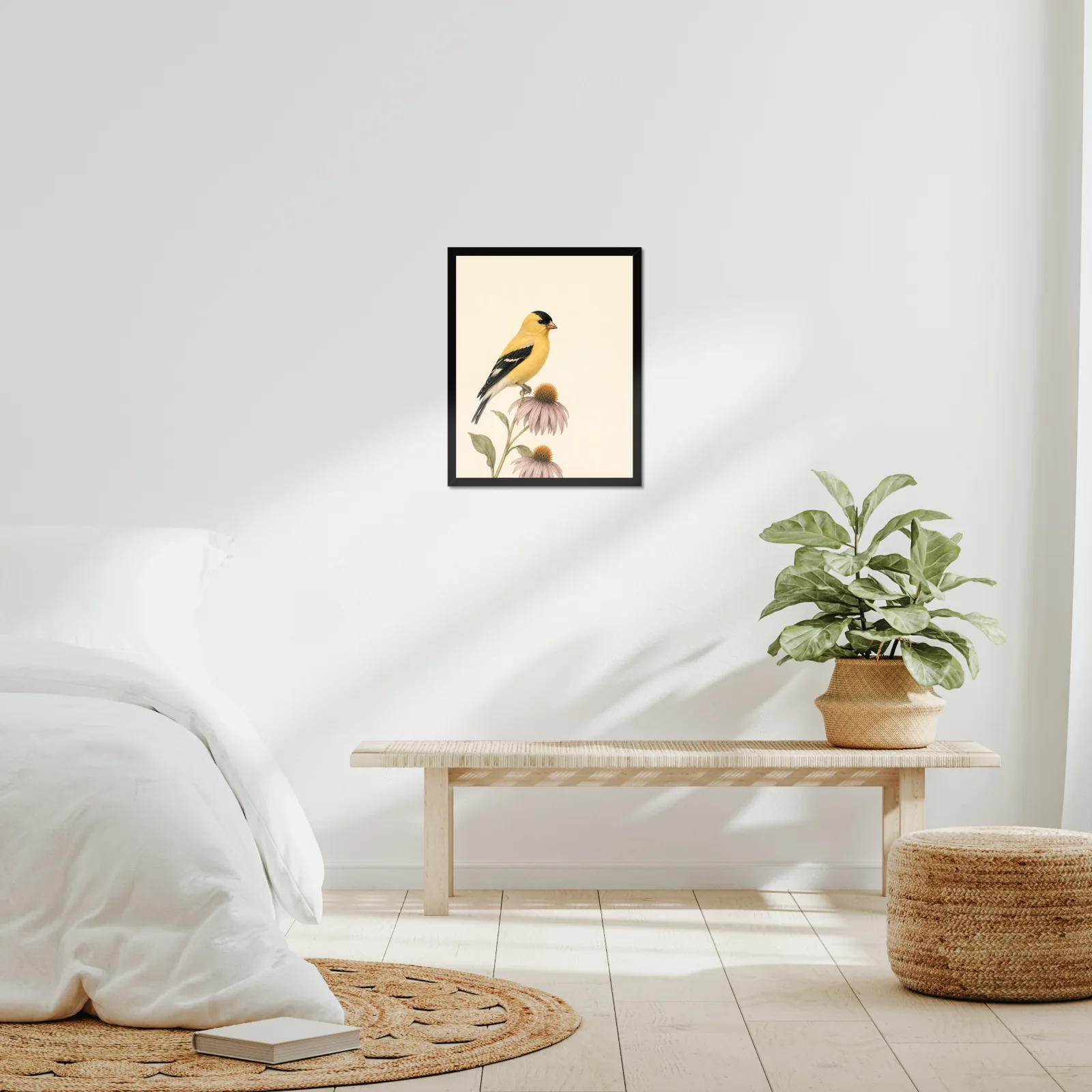 An Audubon-style bird print hung in a room, in a plain moulding